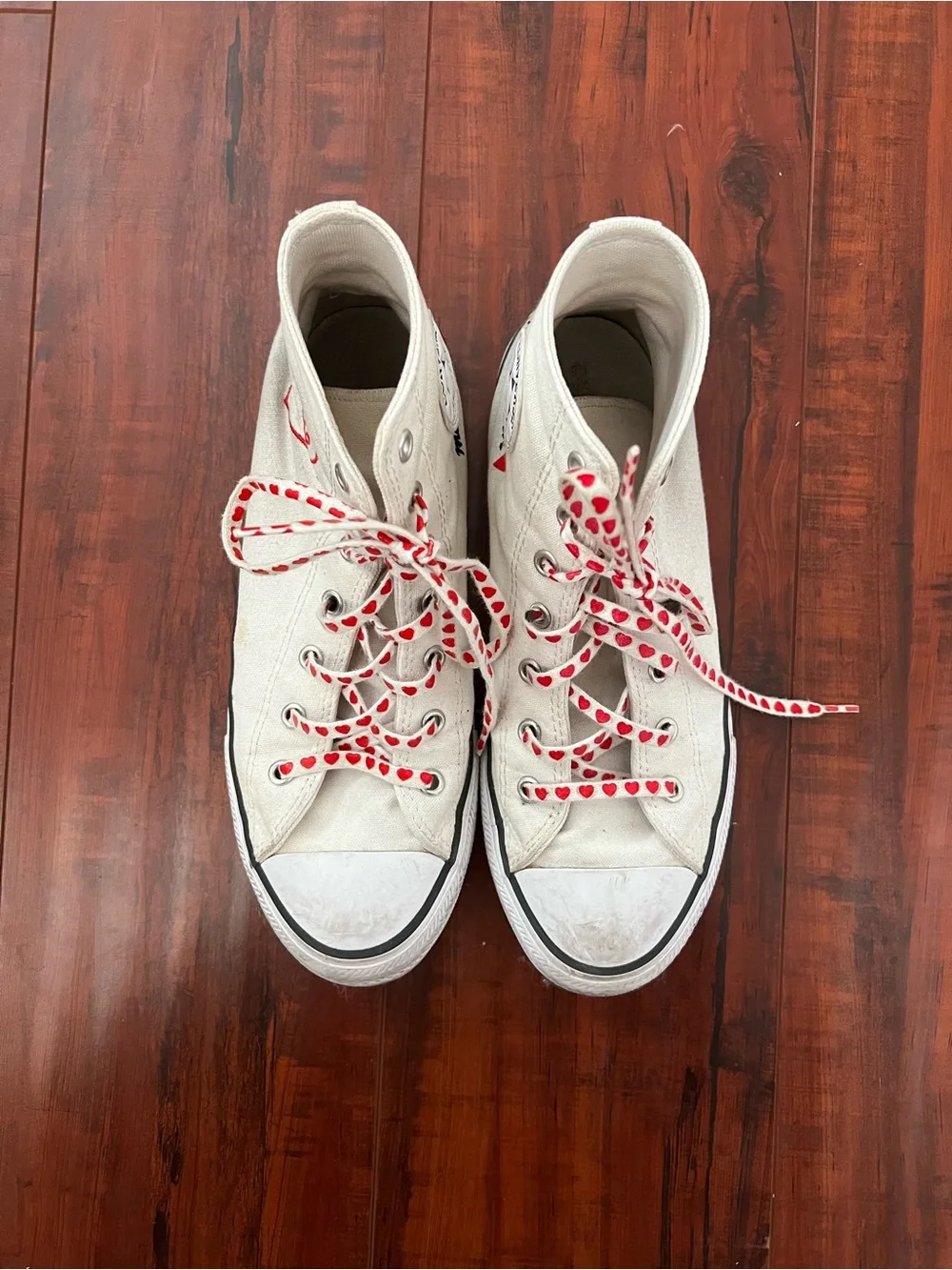 Converse White High-Top Sneakers with Red Heart Laces